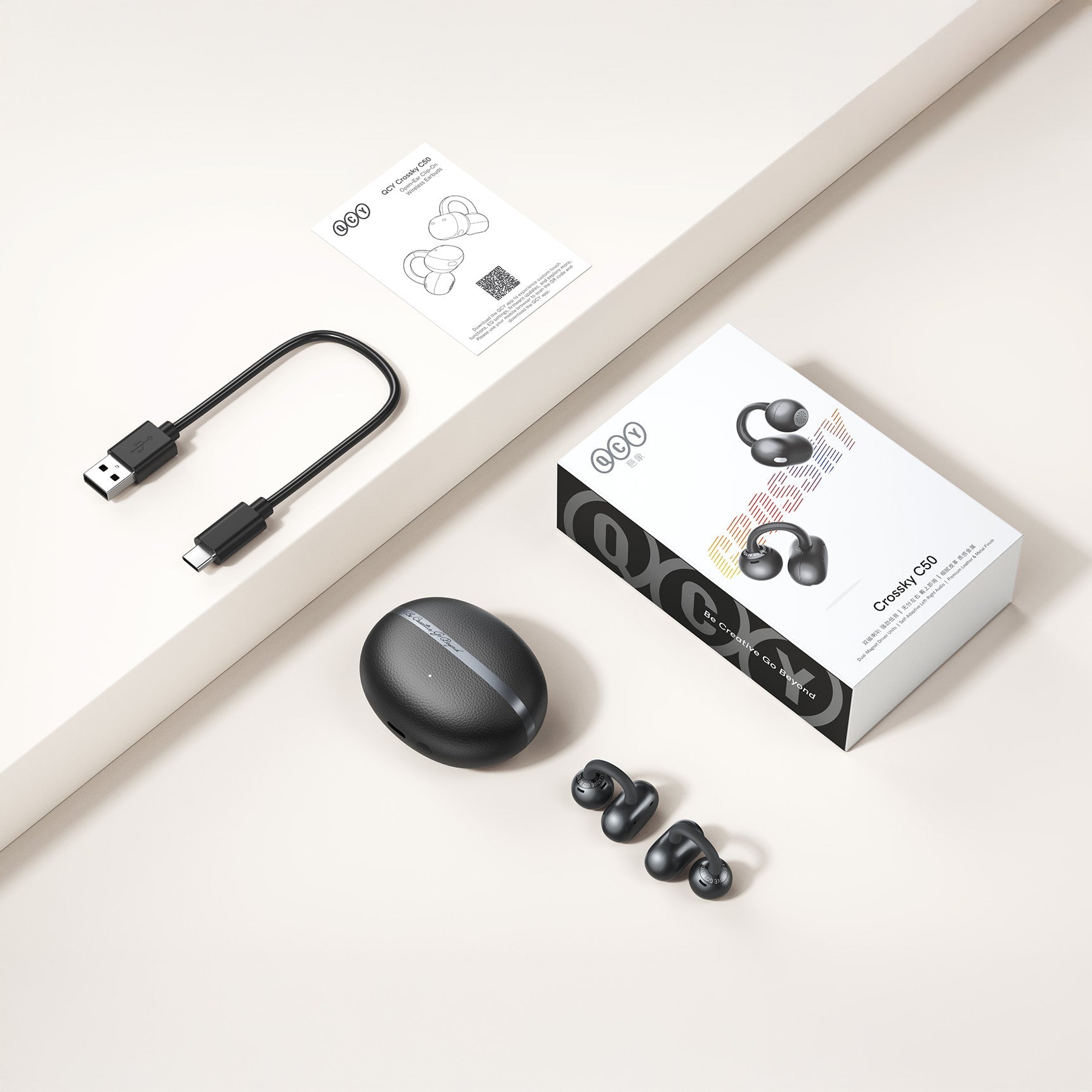 QCY Crossky C50 prawdziwie bezprzewodowe słuchawki douszne z etui ładującym, USB-C i instrukcją.
