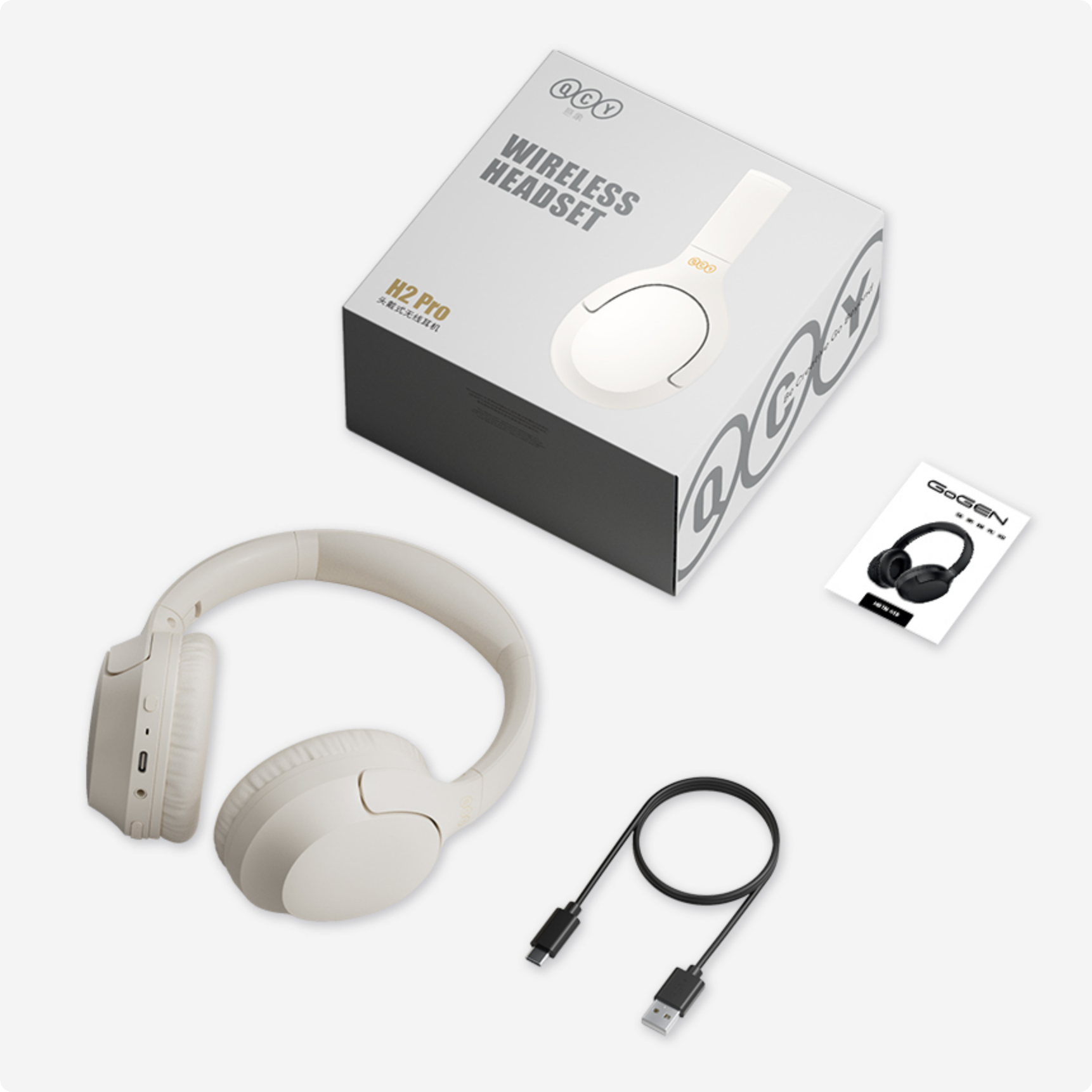 QCY H2 Pro Bezprzewodowe słuchawki – białe, bezprzewodowe, z kablem ładującym USB i instrukcją.